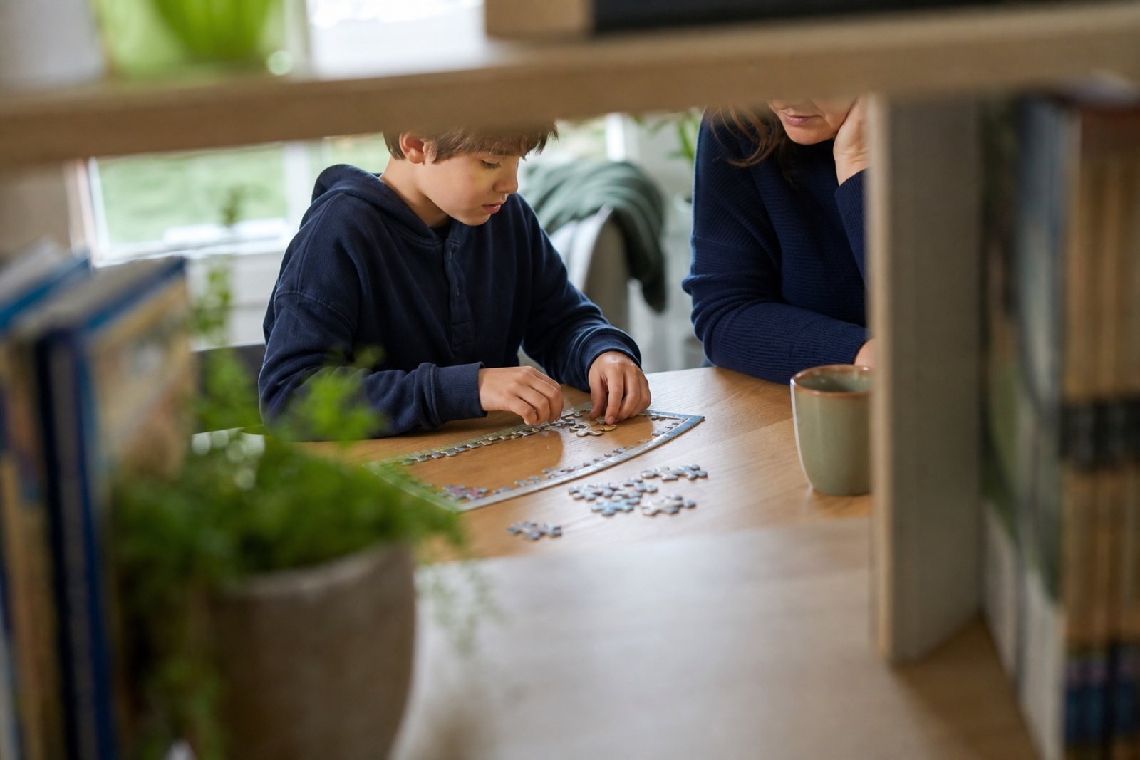 Family members spending quiet time together at home